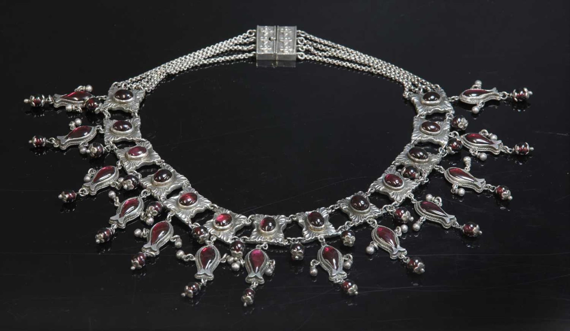 A Victorian silver garnet fringe necklace,