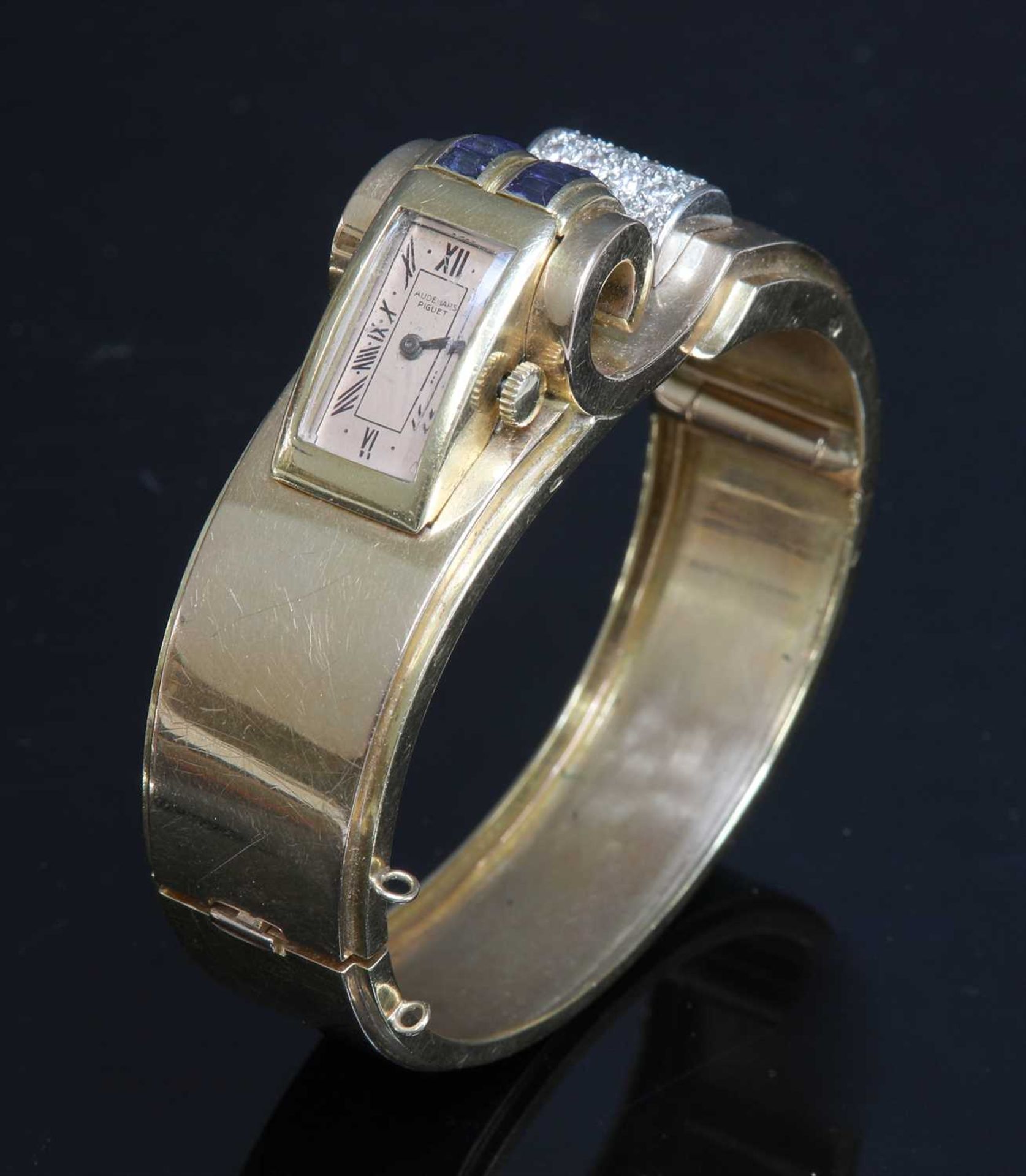 A French odeonesque gold and platinum, sapphire and diamond mechanical bangle watch, c.1940, - Image 6 of 15