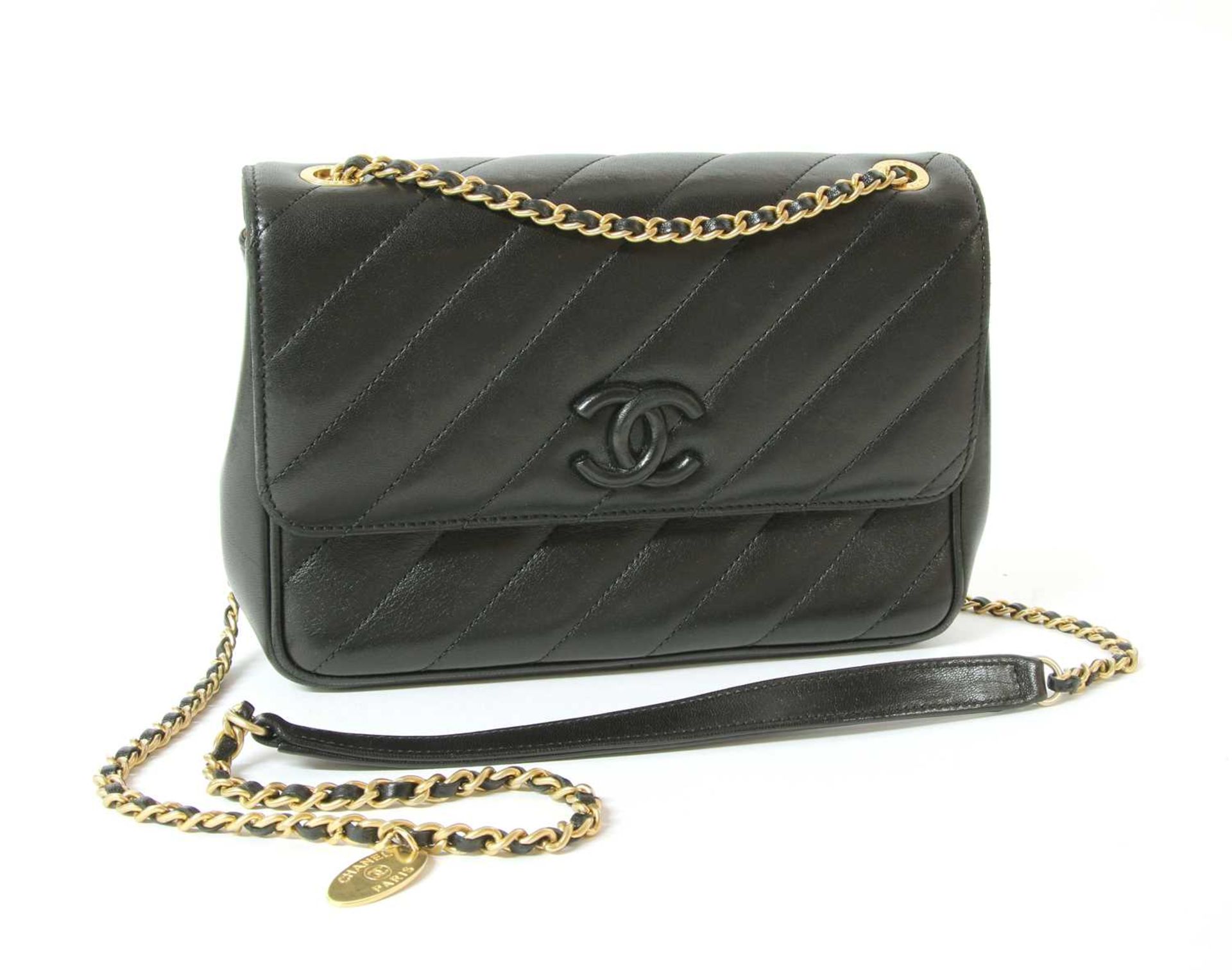 A Chanel black chevron flap bag,