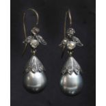 A pair of cultured pearl diamond drop earrings,