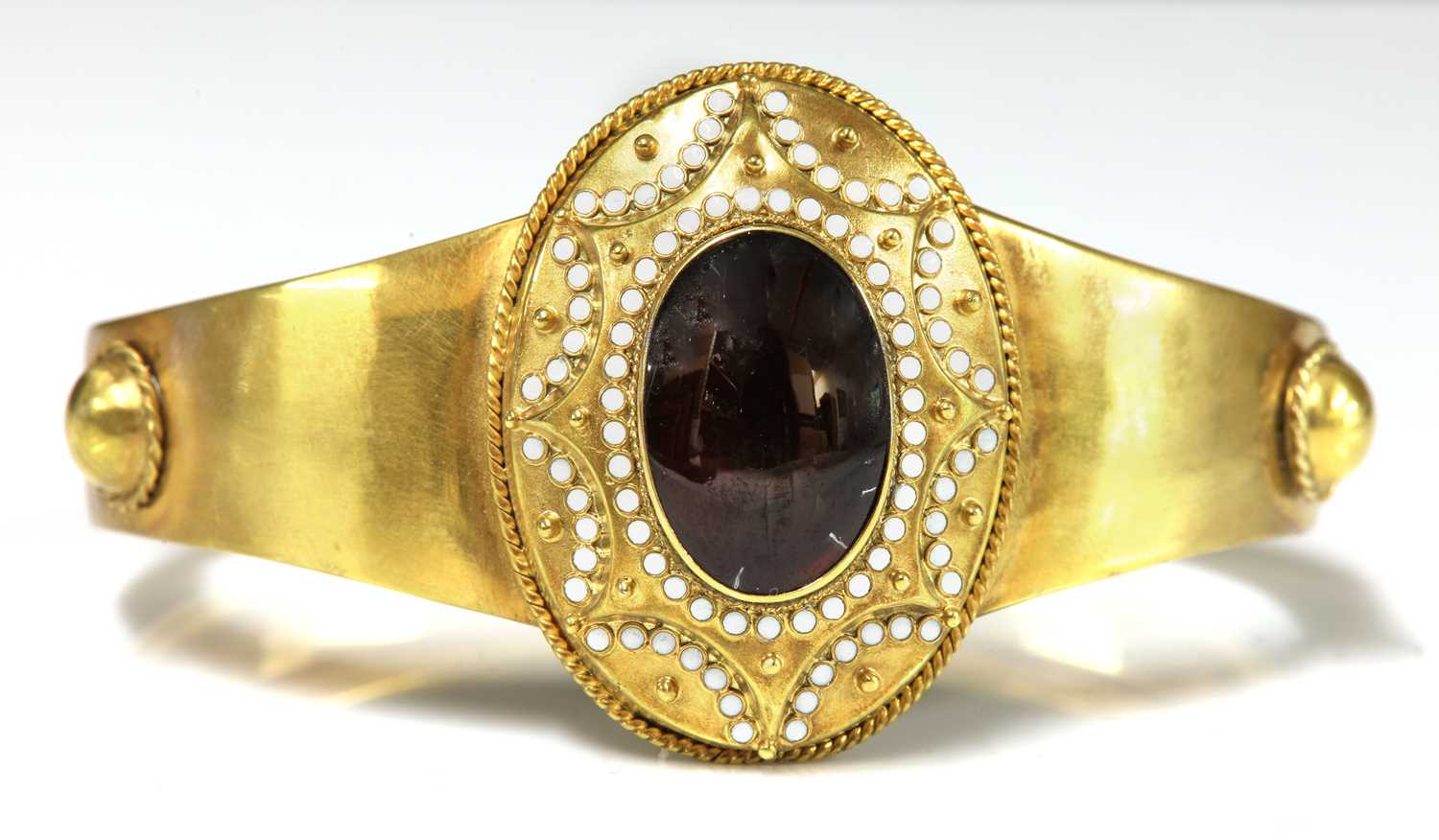 A Victorian gold garnet and enamel hinged bangle, c.1860, - Image 2 of 2