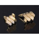 A pair of 18ct gold interlocking chevron design cufflinks,