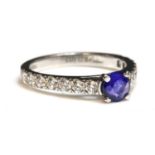 A platinum single stone sapphire ring,