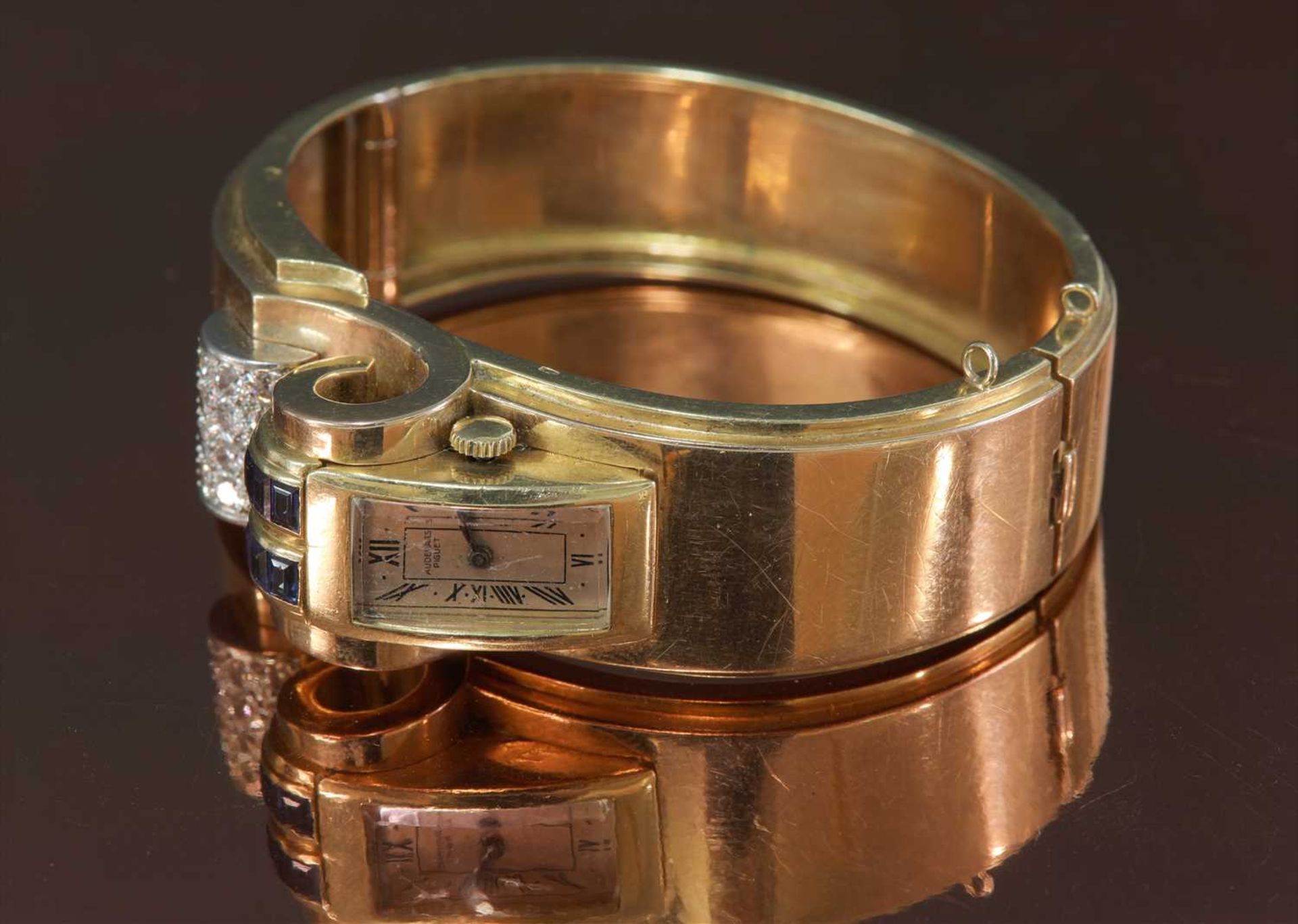 A French odeonesque gold and platinum, sapphire and diamond mechanical bangle watch, c.1940, - Image 5 of 15