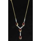 An 18ct two colour gold ruby and diamond 'Y' necklace,