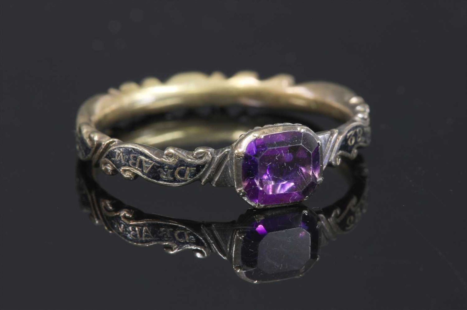 A Georgian gold amethyst memorial ring, c.1747,