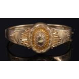 A Victorian Etruscan Revival gold bangle, c.1870,
