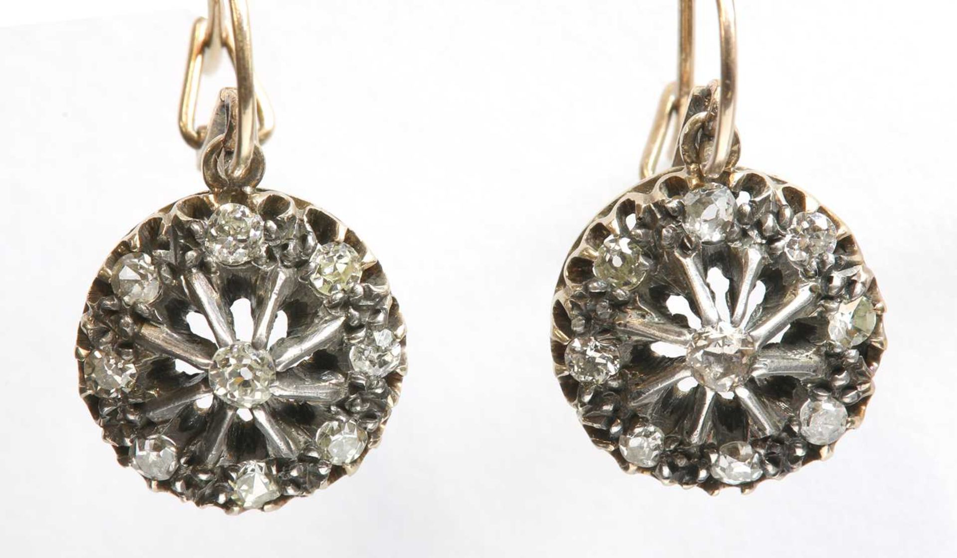 A pair of Edwardian, diamond set, gold and silver cluster drop earrings, c.1910,
