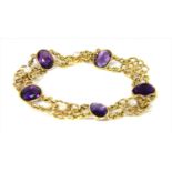 An Edwardian gold amethyst and pearl bracelet,