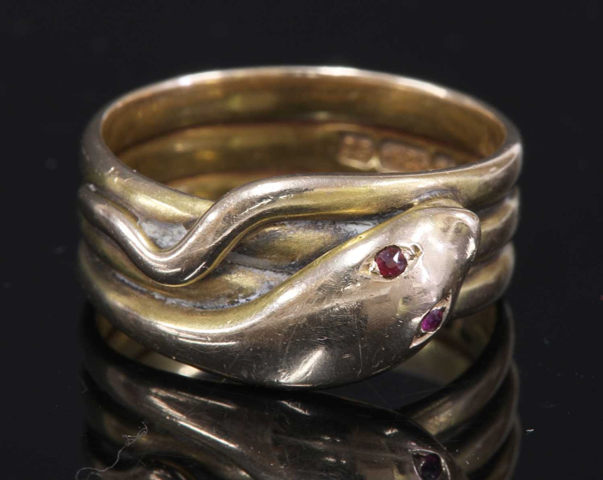 A Victorian 15ct gold ruby set snake or serpent ring,