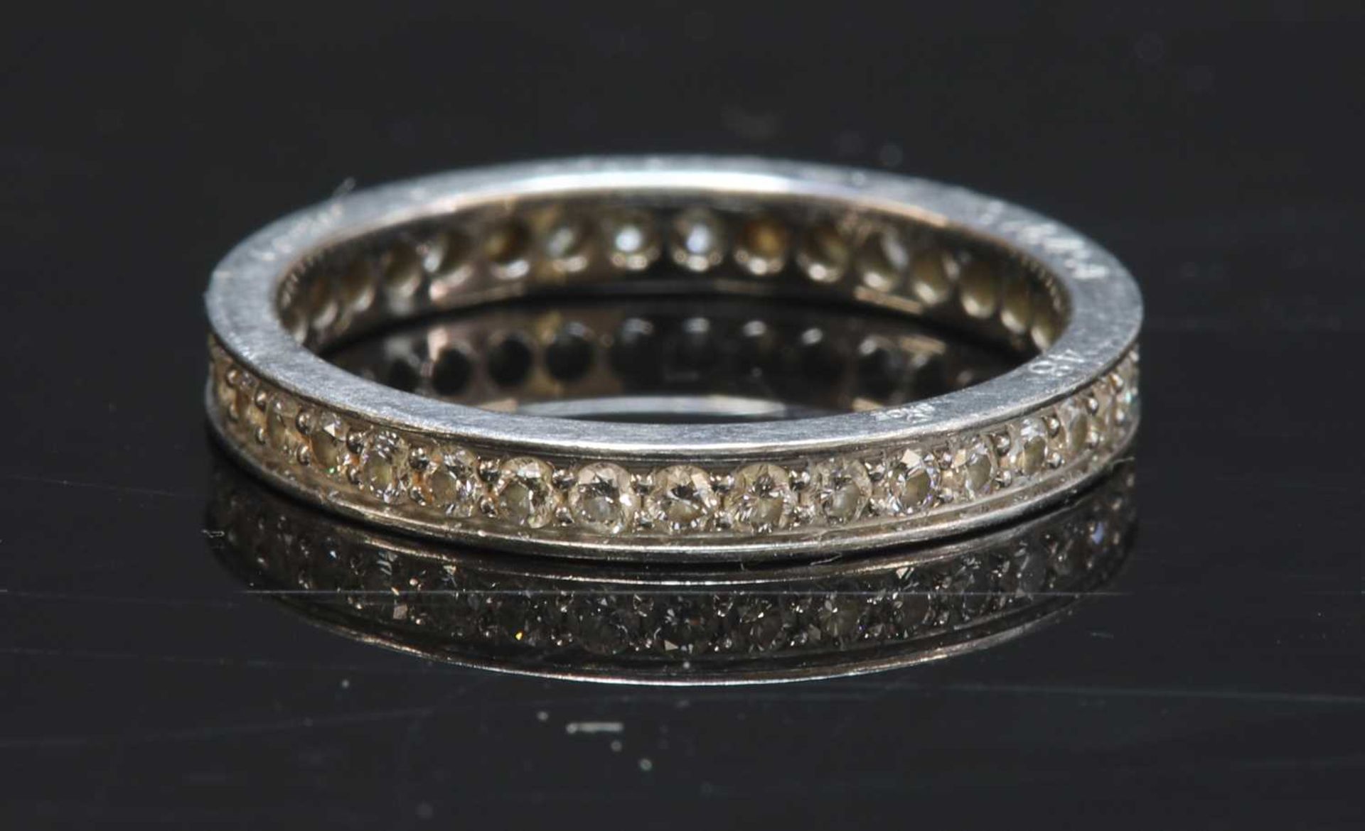 A platinum diamond set full eternity ring by Cartier,
