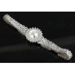 A ladies' 18ct white gold Longines diamond set mechanical bracelet watch, c.1970,