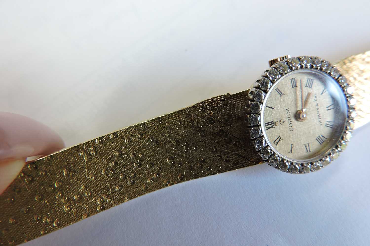 A ladies' 18ct gold diamond set mechanical bracelet watch, - Image 2 of 3