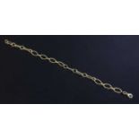 An 18ct gold oval single and double ring link bracelet,