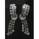 A pair of diamond set waterfall drop earrings, c.1940,