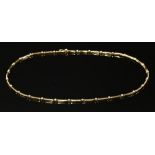 An 18ct gold diamond set bar link necklace by Eric Smith, c.2009,