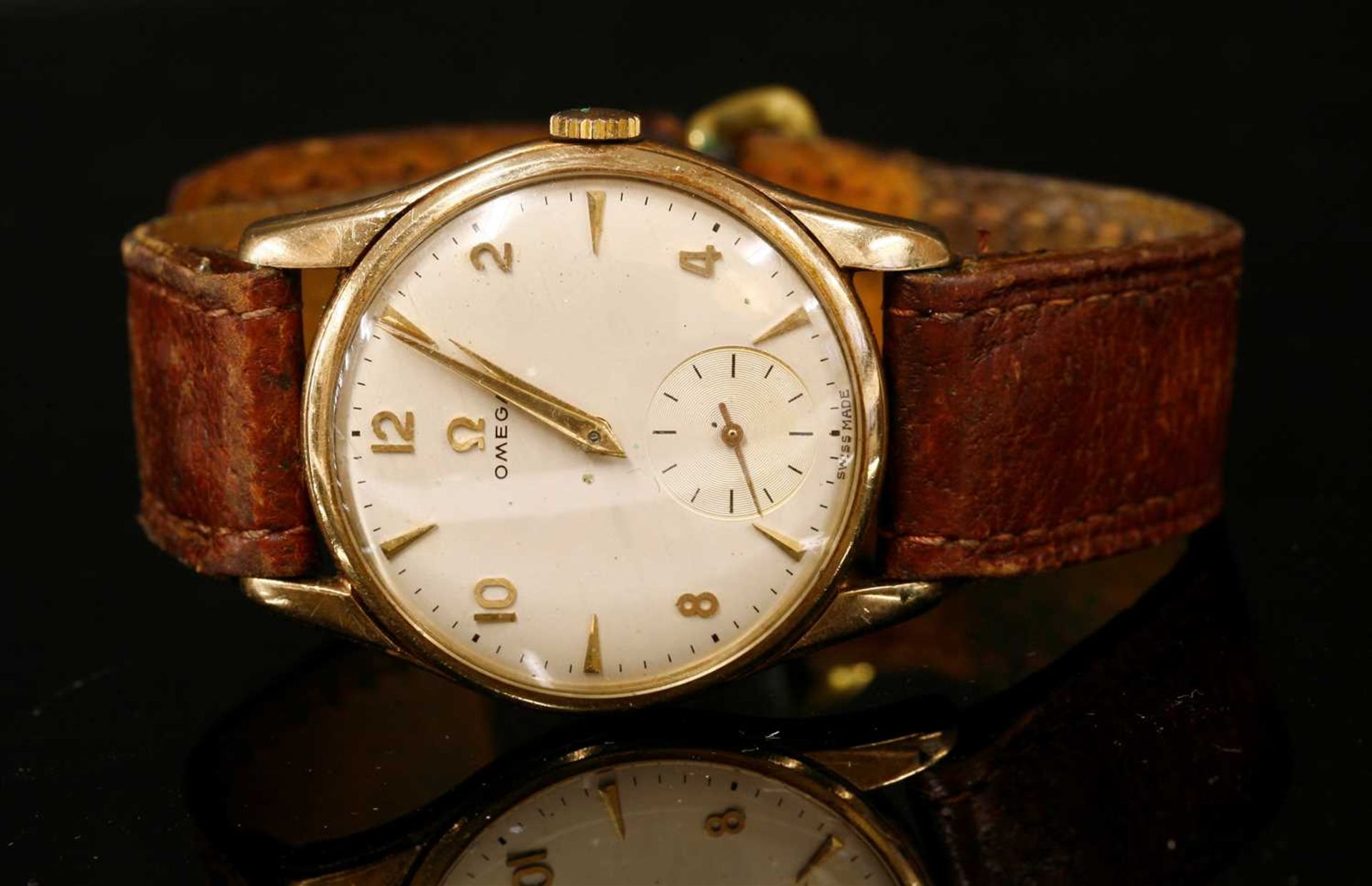 A gentlemen's 9ct gold Omega mechanical strap watch, c.1960