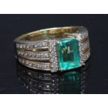 An 18ct gold single stone emerald ring,