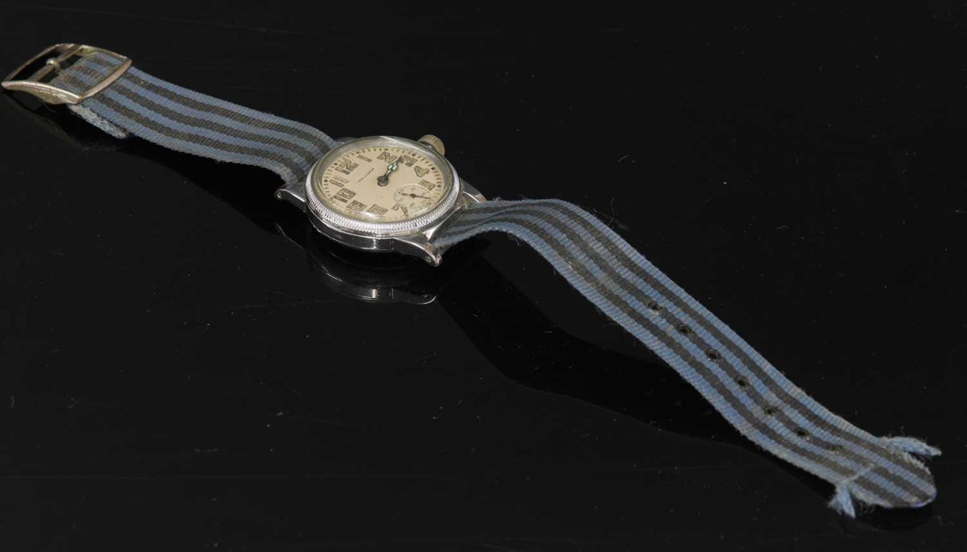 A gentlemen's stainless steel Waltham military WWII mechanical strap watch,