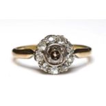 A diamond cluster ring,