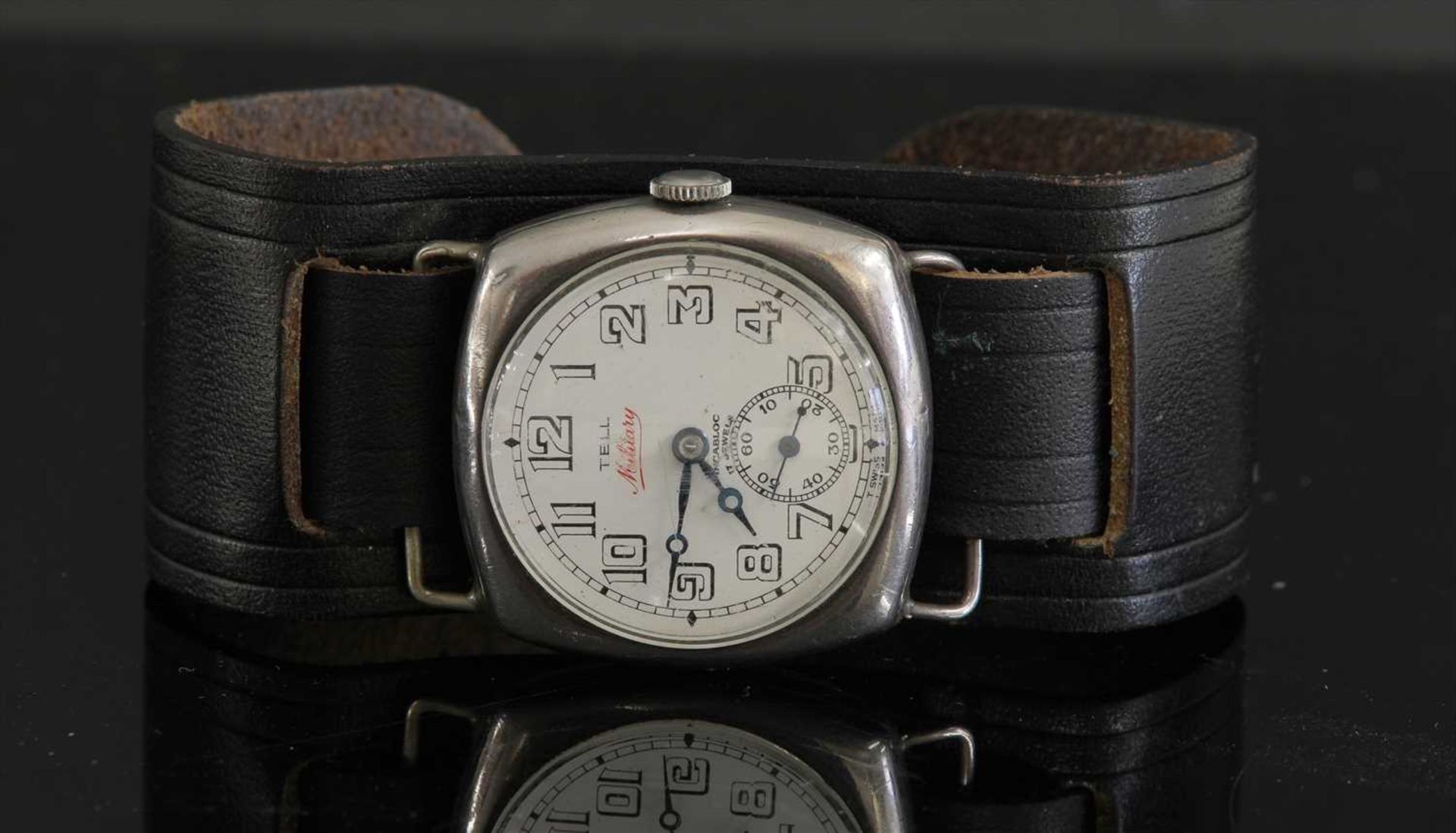 A gentlemen's sterling silver Tell Military or Trench mechanical strap watch, c.1917,