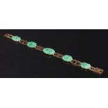 A gold jadeite bracelet,