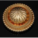 A Victorian Etruscan Revival gold shield form brooch, c.1870,