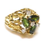 An American tourmaline and diamond bombé form cluster ring, c.1970,