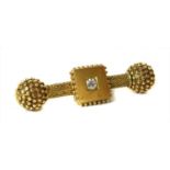 A Victorian Etruscan revival gold diamond dumb-bell bar brooch, c.1870,