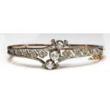 A French diamond set hinged bangle, c.1890,