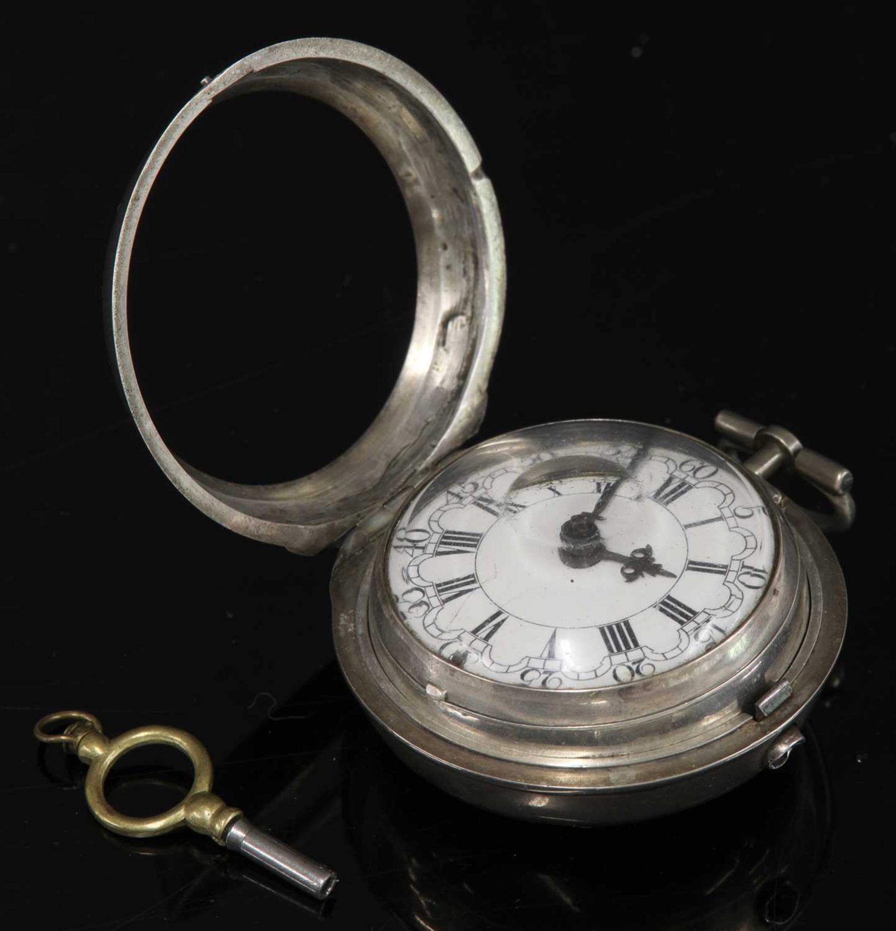 A silver pair cased open-faced pocket watch,