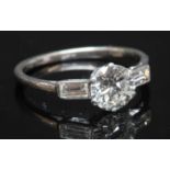 A white gold and platinum single stone diamond ring,