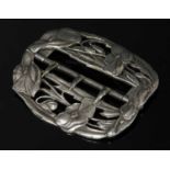 An Art Nouveau sterling silver belt buckle by William Comyns,