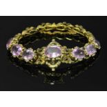 A Victorian gold amethyst bracelet, c.1850,