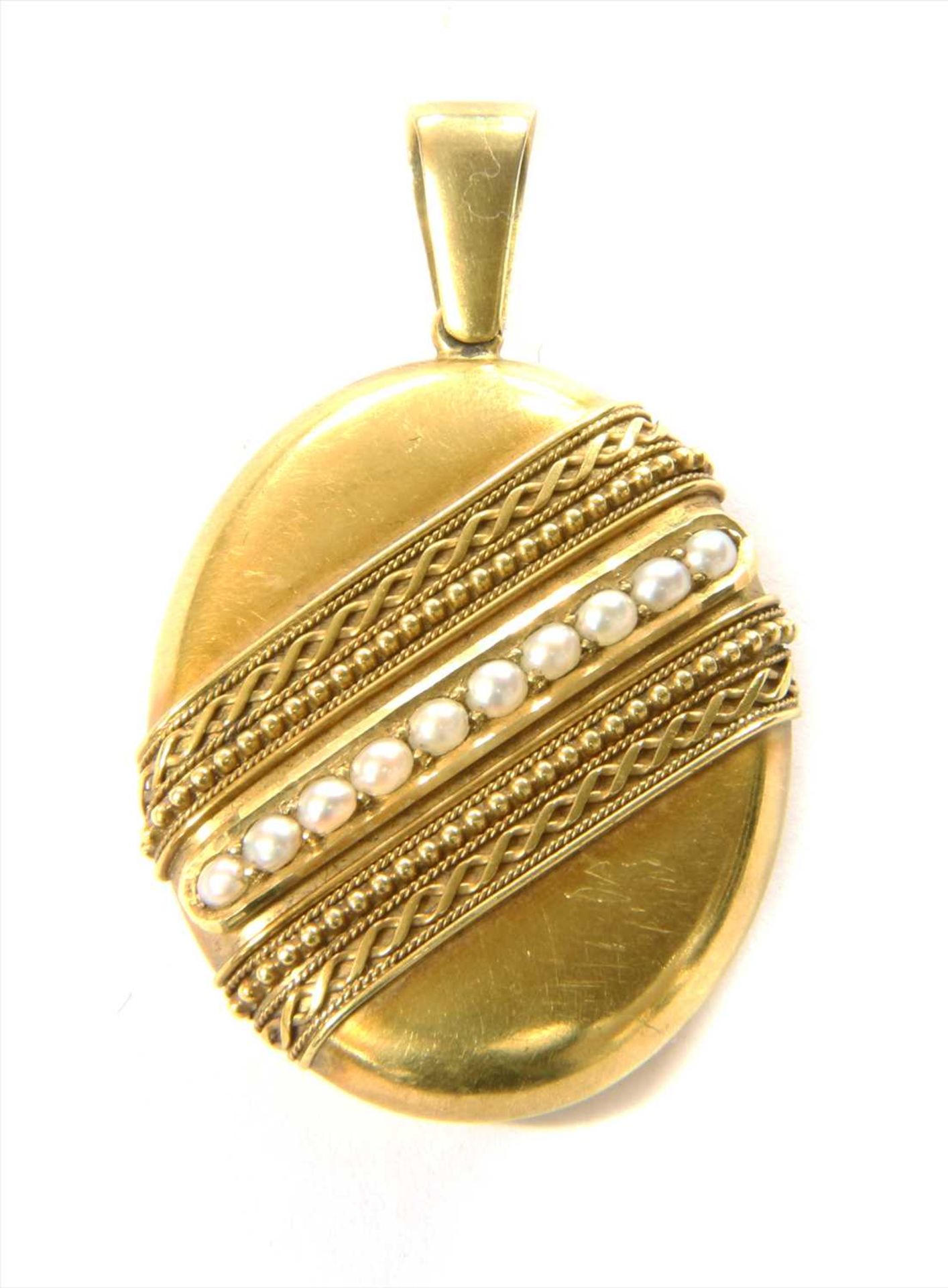 A Victorian gold split pearl oval locket,