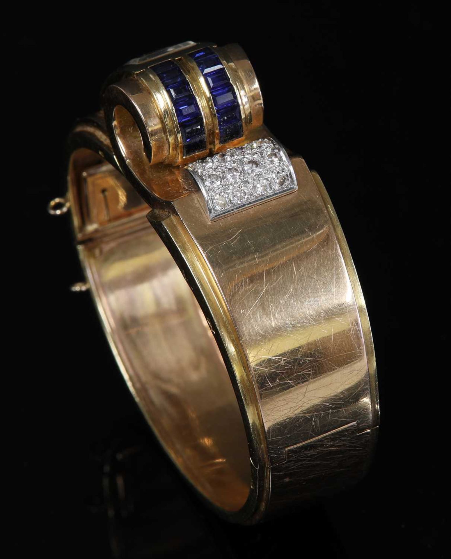 A French odeonesque gold and platinum, sapphire and diamond mechanical bangle watch, c.1940, - Image 4 of 15