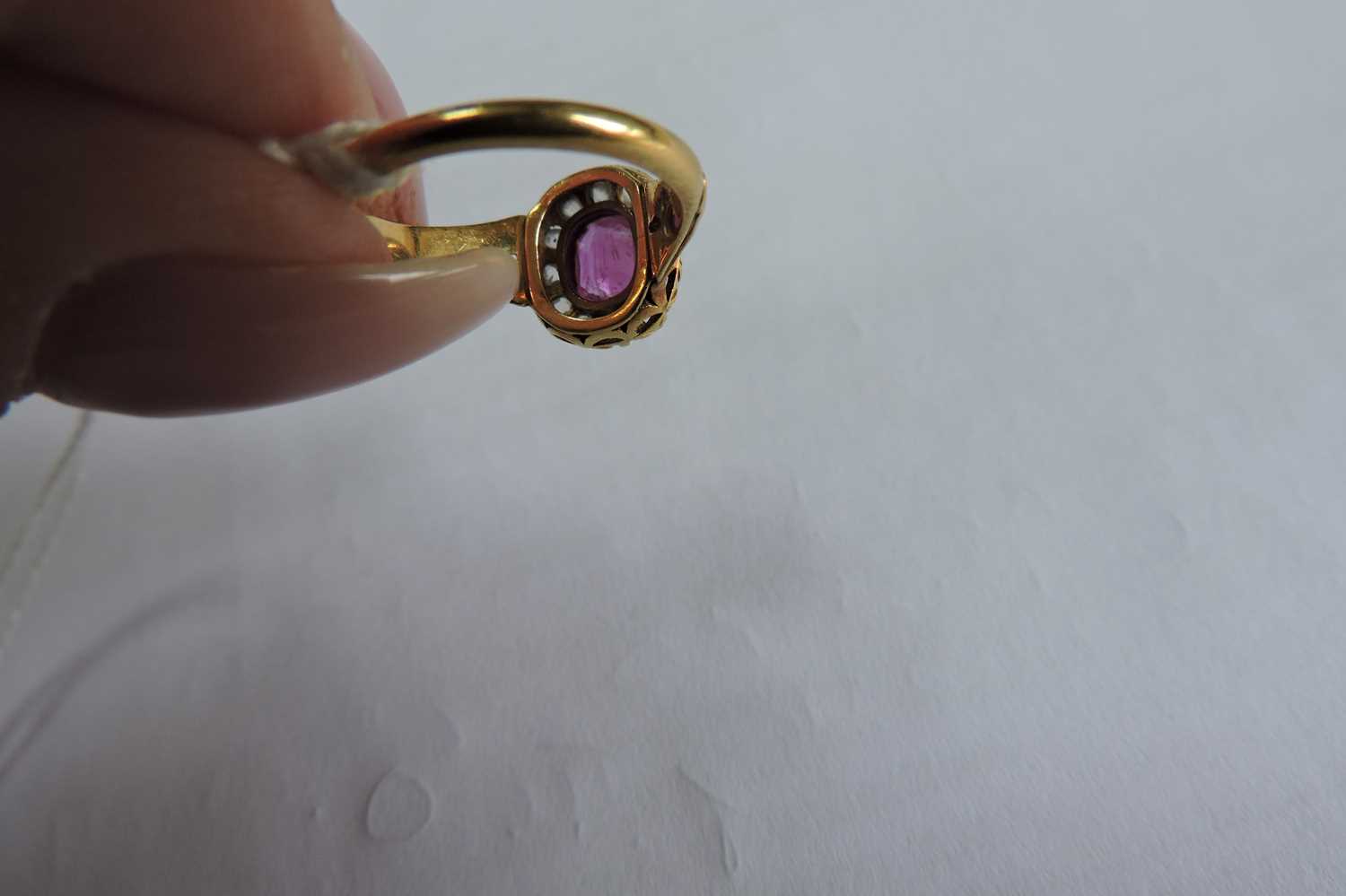 A late Victorian ruby and diamond cushion-shaped cluster ring, - Image 6 of 7