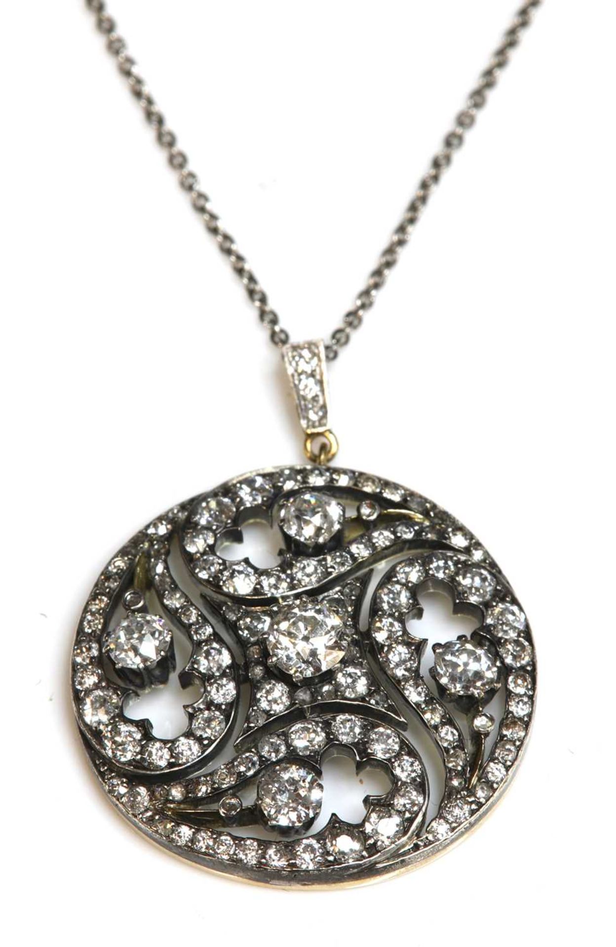 A Victorian diamond set circular pendant,