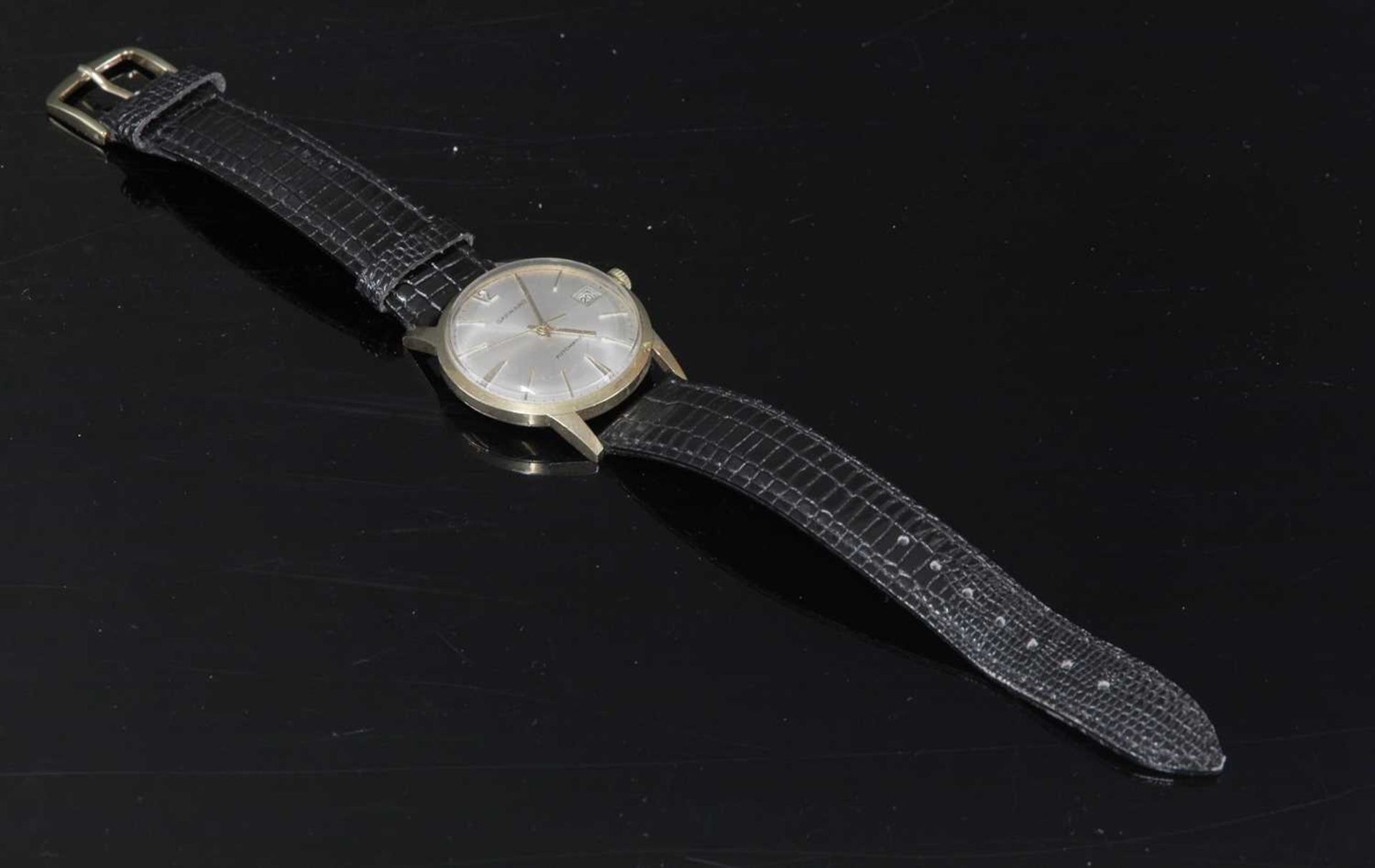 A gentlemen's 9ct Garrard automatic strap watch, c.1970,