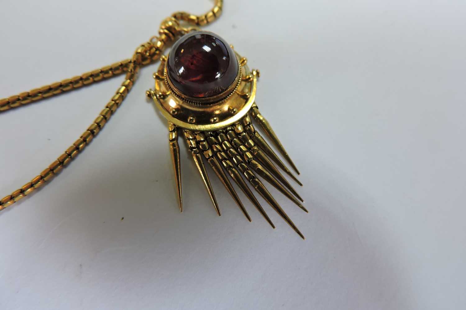 A cased Victorian gold and garnet set Etruscan Revival swag and fringe necklace, c.1860, - Image 4 of 7