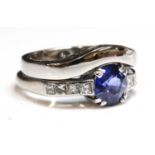 A white gold single stone sapphire ring,