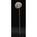 A cased Victorian reverse painted crystal intaglio stick pin,