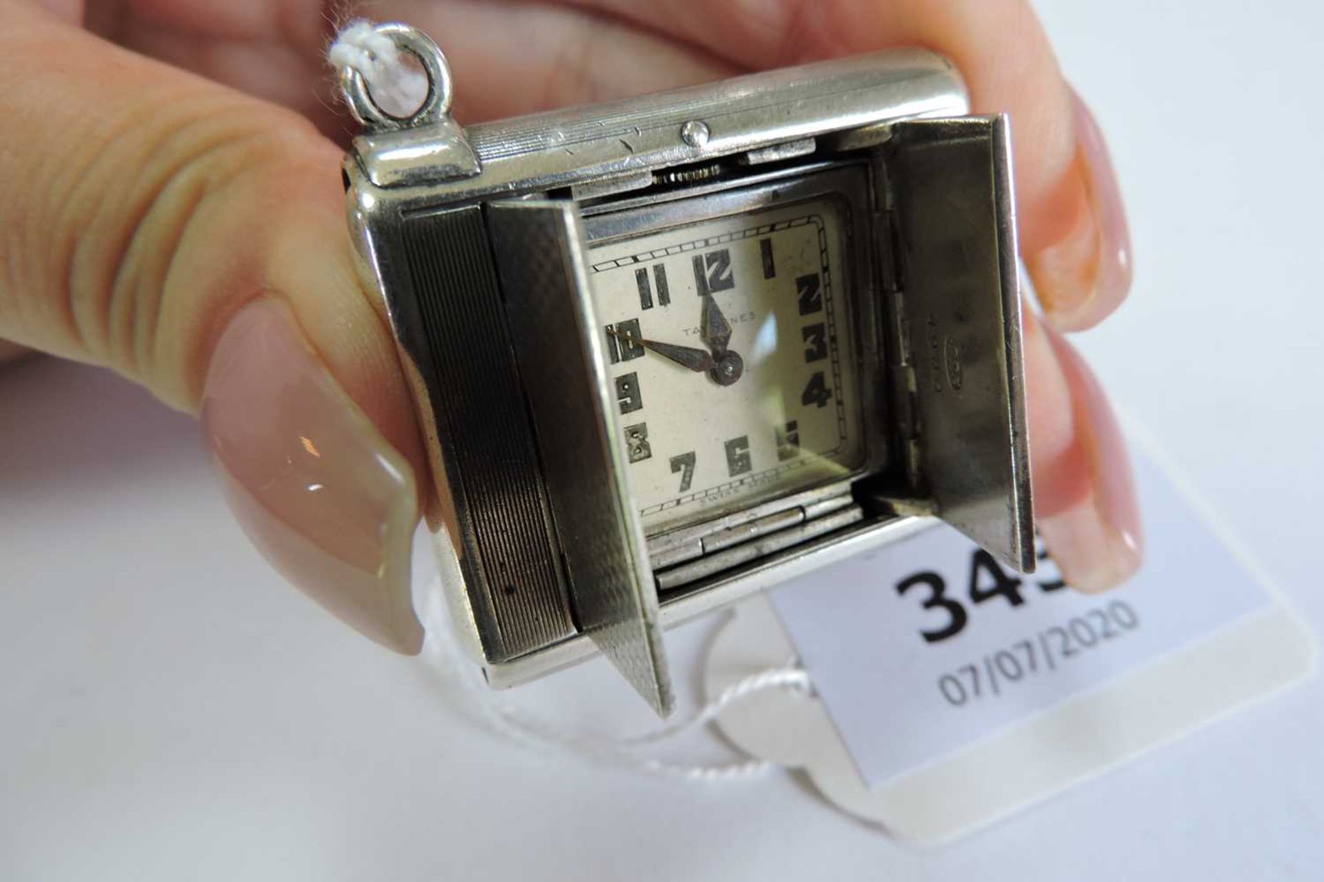 An Art Deco Swiss sterling silver purse watch, c.1929, - Image 6 of 7