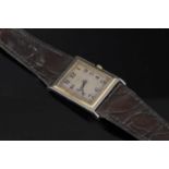 A gentlemen's Art Deco 18ct two colour gold Asprey mechanical strap watch, c.1928,