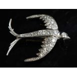 A diamond set swallow brooch, c.1915,