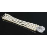 A four row graduated cultured pearl bracelet, c.1950,