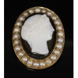 A Victorian hardstone and split pearl cameo brooch,