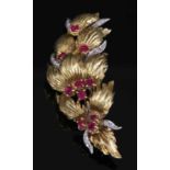 An 18ct yellow and white gold ruby and diamond spray brooch, c.1960,