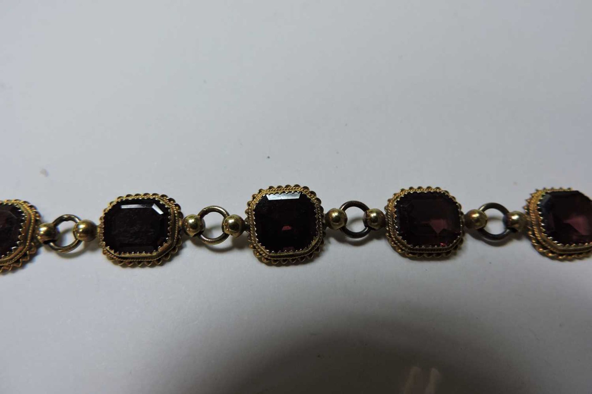 A gold garnet set rivière necklace, - Bild 3 aus 4