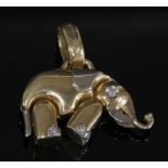 An Italian two colour gold diamond elephant pendant by Baraka,